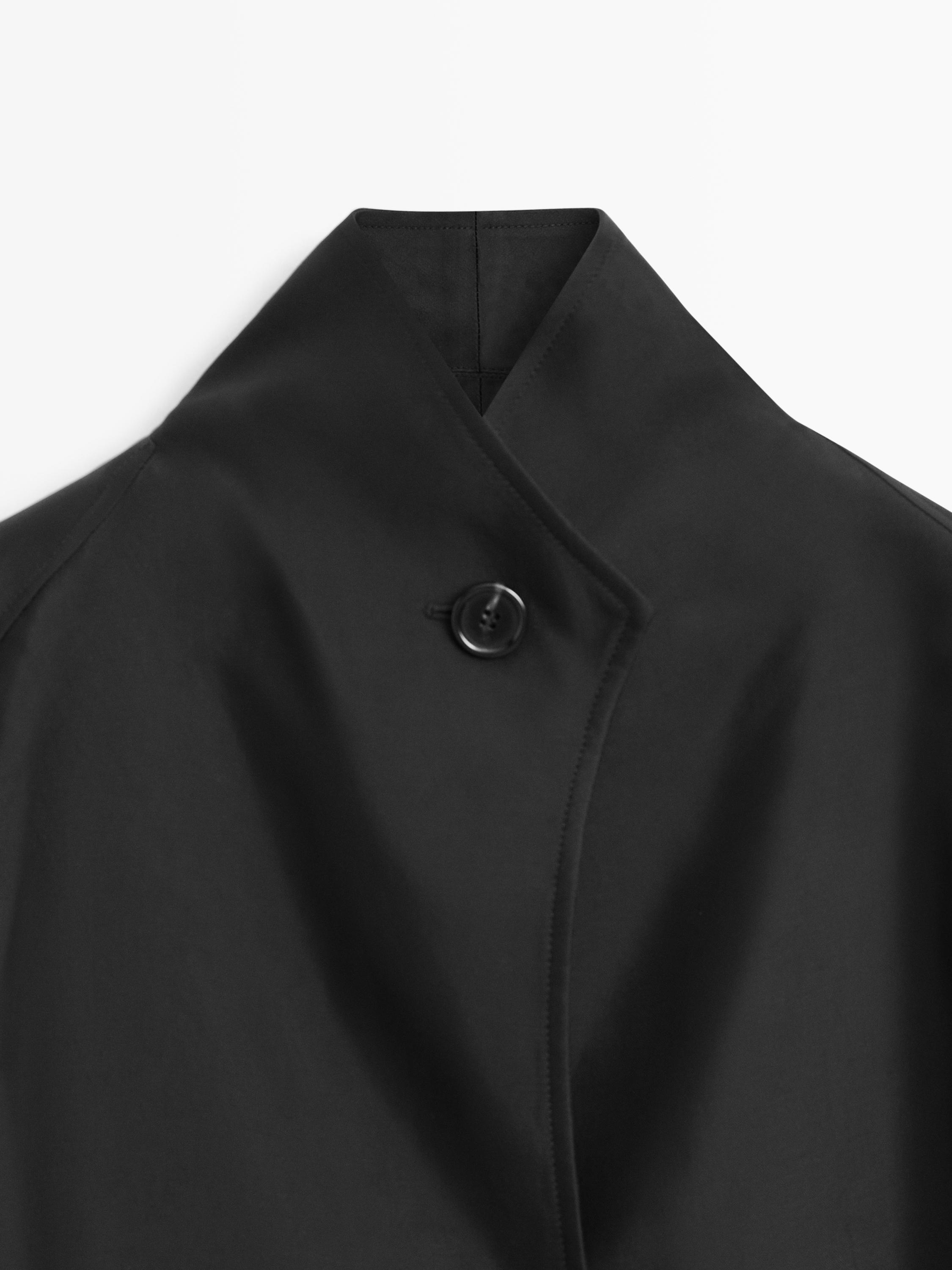 Flowing voluminous cape with button details